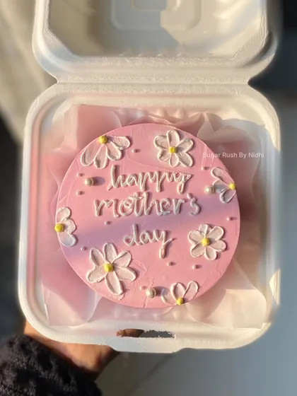 A pretty pink floral bento cake for Mother's Day. A sweet way to show your mom some love.
