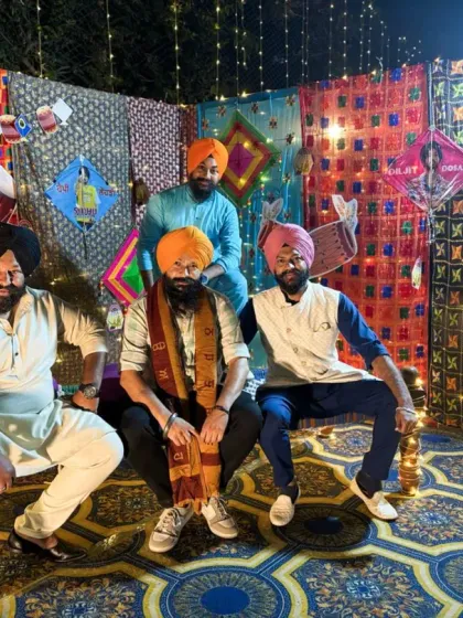 Posing with my friends at a Lohri wedding event. These celebrations are about community and friendship, and I'm honored to provide the soundtrack for such special moments.
