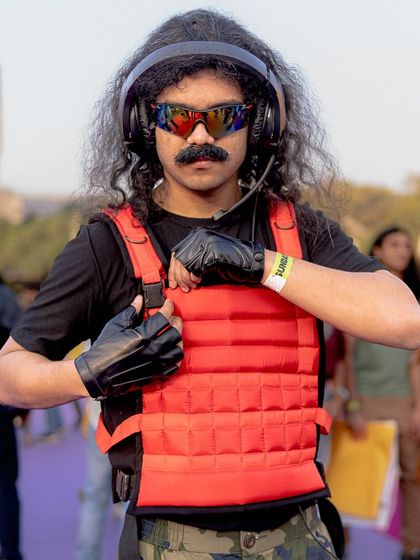 This Dr. Disrespect cosplay was spot on. I took a full-body shot to capture the entire iconic outfit, from the headset to the tactical vest.