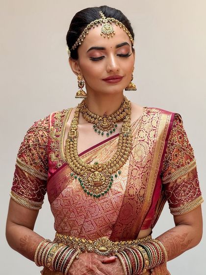 An eyes-closed shot to showcase the soft, blended eyeshadow and the flawless, airbrushed finish of the skin.