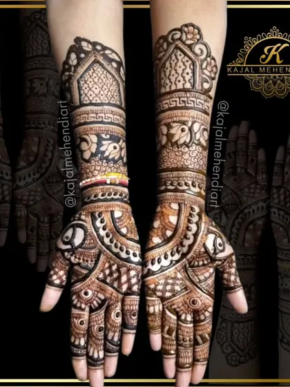 This design for a bridesmaid features a mix of styles, with bold peacocks on one hand and delicate floral patterns on the other, tied together with matching wrist bands.