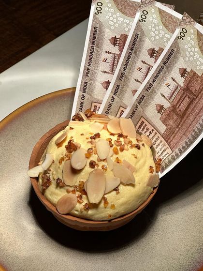 Another view of our "sweet money" dessert. We love to surprise and delight guests with our innovative and whimsical plating ideas.