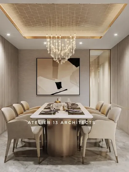A dining room designed for intimate gatherings, enclosed with wood-paneled walls to create a cozy, cocoon-like effect. A delicate crystal chandelier and a gold-leaf ceiling detail add a touch of opulence from above.