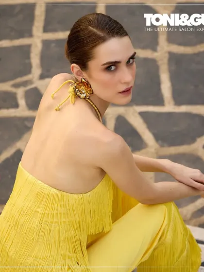 A sharp, editorial look from a recent fashion campaign. The focus here is on clean lines, from the sculpted cheekbones to the defined, neutral eye, creating a look that is both modern and powerfully chic.