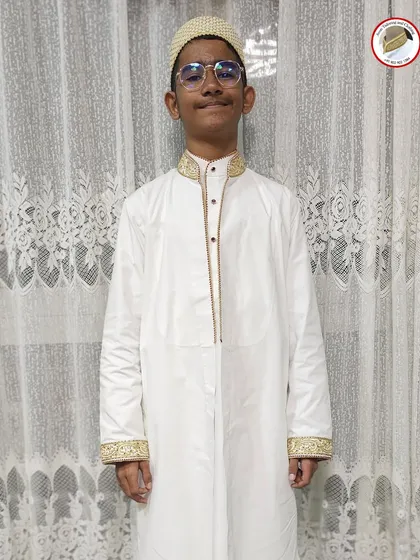 I am truly thankful for kind feedback from my customers. This young man looks wonderful in the saya kurta I stitched for him, and his family's appreciation means the world to me.