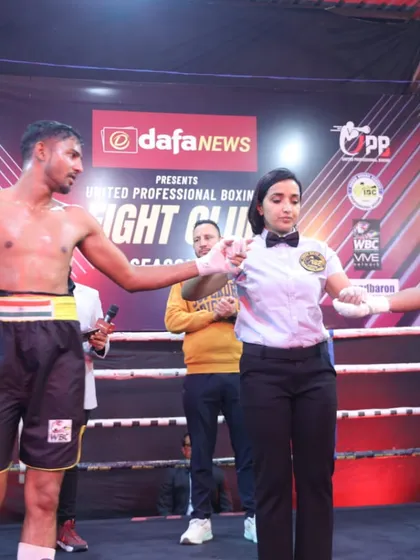 Sportsmanship in the ring after a tough fight. Respect for your opponent is a core value I teach.