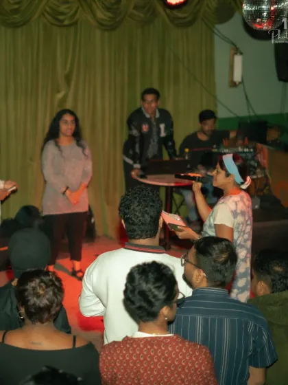 Engaging with the audience during a hip-hop event. I make sure the crowd is part of the show, creating an interactive and electric atmosphere.