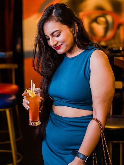 A guest enjoying a cocktail.