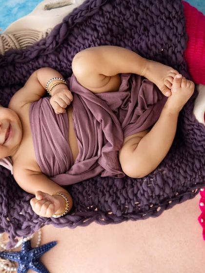 An overhead shot of the sleeping mermaid, showing off the full costume and her sweet, peaceful expression.