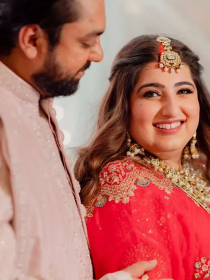 A collection of moments from this bride's reception. Her look was all about soft glam, with flowing waves and makeup that highlighted her joyful smile, creating a perfect look for her evening celebration.