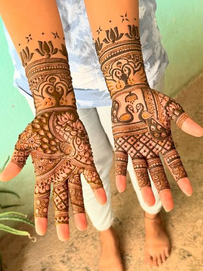 A full view of the back of the hands for Asha's engagement mehendi.