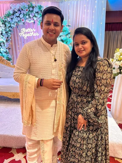 Actor Dev Joshi and his wife posing together at their reception. I provided the makeup and hairstyling for his family members for this special occasion.
