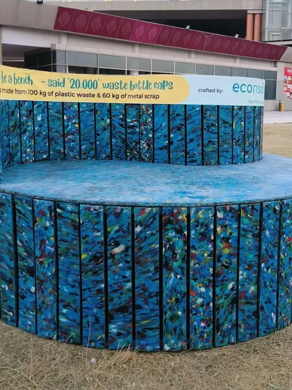 A frontal view of our spiral bench, showing how the tiered seating creates a unique, interactive space in public areas.