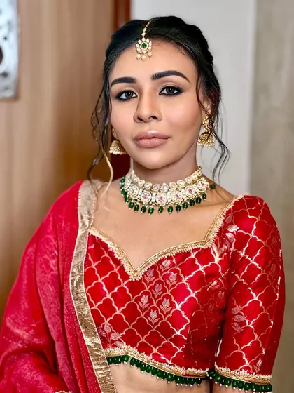 A portrait of the bride, looking confident and serene. The makeup is designed to be respectful of the religious ceremony while still feeling glamorous.
