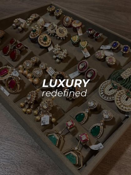 Luxury redefined. A tray filled with a dazzling assortment of our handcrafted earrings, ready for a client to explore.