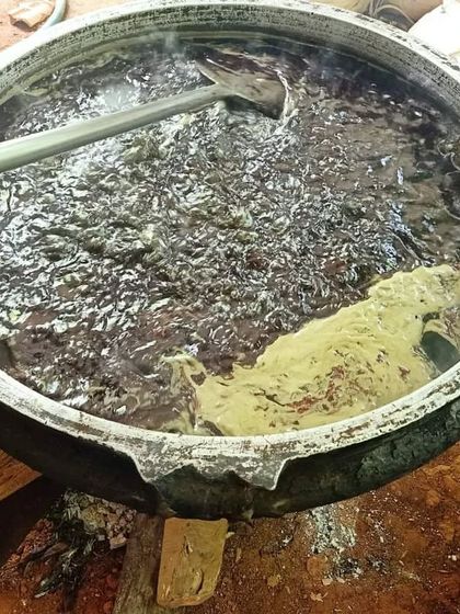 The kaachenna bubbling away in the uruli. This is a critical stage where the water content from the herbal extracts evaporates, leaving behind a nutrient-rich, potent hair oil. The aroma at this stage is just amazing.