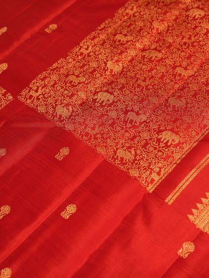 A closer look at the pallu, where the intricate weaving of the animal motifs is clearly visible, showcasing the skill of our artisans.