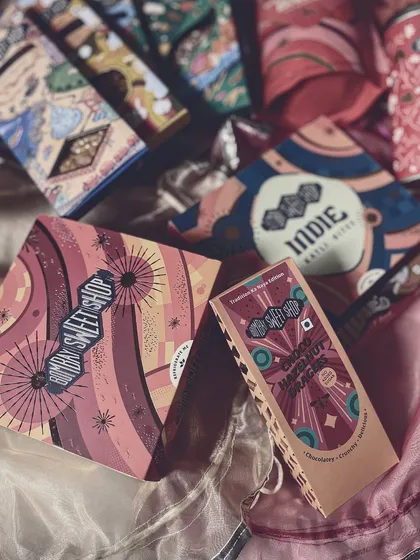 A selection of artisanal Indian sweets from Bombay Sweet Shop. For my festive hampers, I love to source from local, high-quality brands that celebrate vibrant flavors and beautiful packaging.