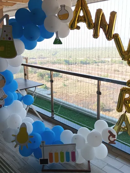 Another angle of the Science theme setup, showing the foil name balloons.