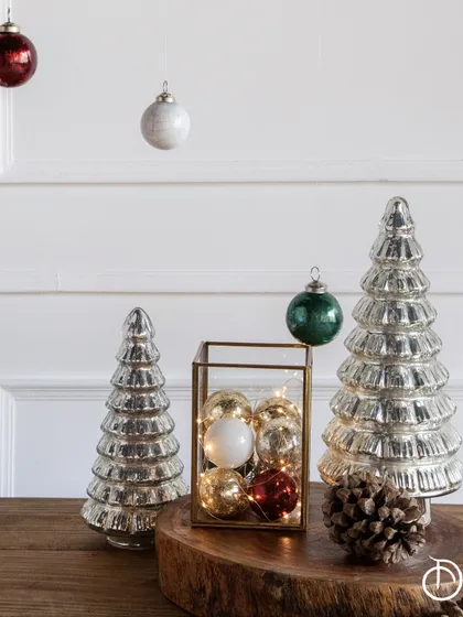 Daydreaming about Christmas! My Christmas shop has all your last-minute holiday decor needs, including these beautiful glass trees and festive baubles, perfect for creating a warm and inviting atmosphere.