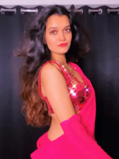 A photoshoot inspired by the iconic saree looks of Bollywood. I draw inspiration from films for both my choreography and my personal style.
