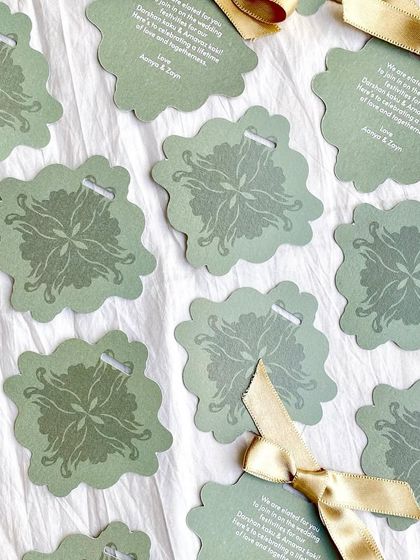 Another view of the die-cut Mehendi gift tags. These small details show a level of care and attention that guests always appreciate.