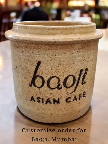 I create branded ceramics that carry your business's identity, like this custom caddy I designed for Baoji Asian Cafe in Mumbai. It’s a functional piece that adds a touch of handmade warmth to their tables.