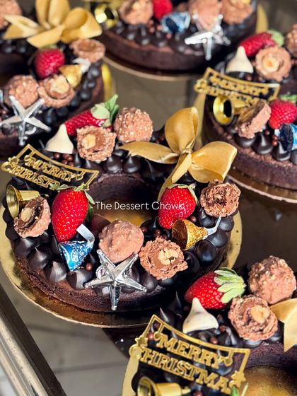 A batch of my Christmas Brownie Wreaths ready for delivery. Each one is decorated with care to bring festive cheer.
