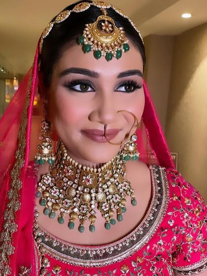 A gorgeous close-up of this bride. Her eyes are beautifully defined, and the nude lipstick is perfect for her look.