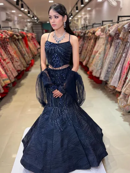 Another angle of the modern navy blue lehenga, showing how the light catches the intricate sequin work. This is a perfect example of a second-hand party gown that looks brand new.