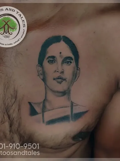 A memorial portrait tattoo of a client's mother, placed on his chest. We take great care with portrait tattoos to honor the memory of loved ones.