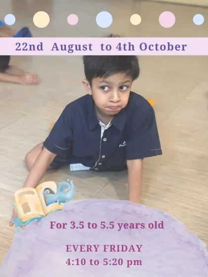 A young boy with a book, his expression full of curiosity. Our program for 3.5 to 5.5 year olds is where purpose is wrapped in joy.