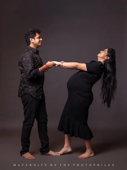 A playful and happy moment between the couple in our studio. We love capturing your real vibe and the goofy laughter you share.