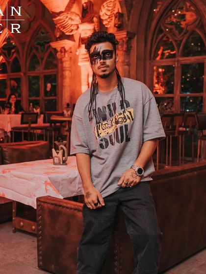 Posing inside Banger, Indore, before the Halloween madness began. The club's gothic architecture was the perfect setting for a spooky night.