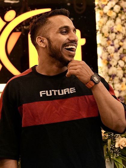 A candid moment of happiness at the gym. We believe in celebrating our hard work and building a strong community.