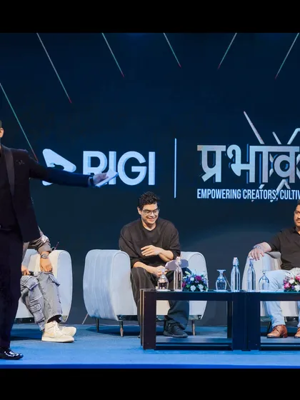 A candid shot from the panel discussion with MS Dhoni and Tanmay Bhatt. I focus on keeping the conversation flowing and engaging for everyone present.