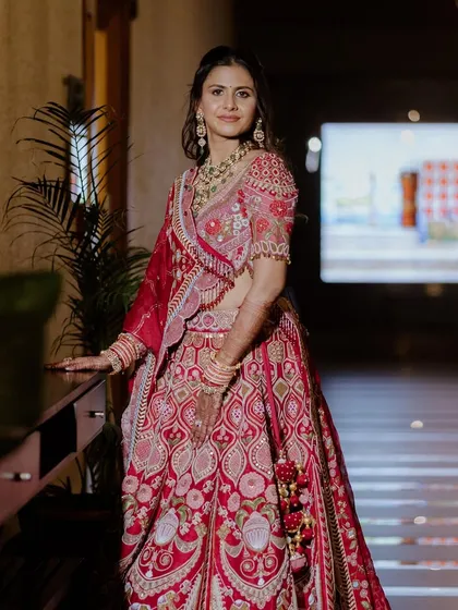 Another angle of Yaksha's elegant wedding day glam. Her skin looks radiant and fresh, proving you don't need heavy makeup to make a statement.