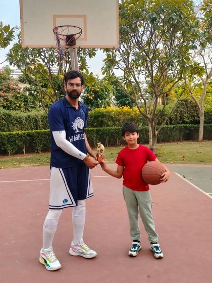 Recognizing another talented player for his performance during the Ranking Day drills. Consistent effort is the key to success.