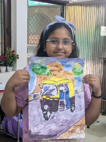 An iconic Indian auto-rickshaw painted with expressive watercolors. This student used wet-on-wet techniques to create a dynamic and colorful background.