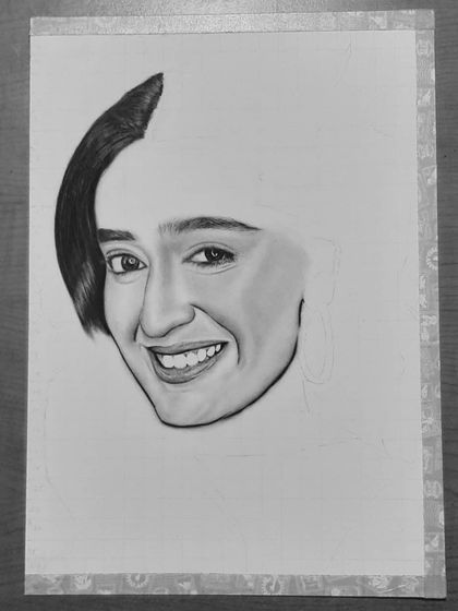 See how I drew Niharika NM's portrait. These images show the process from the initial grid and eye sketch to the final rendering of her hair and smile.