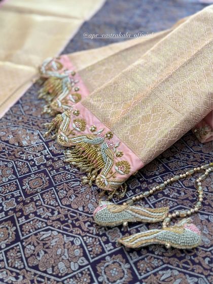 A sleeve with peacock tassels and matching latkans.