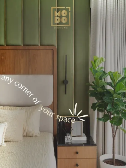 We believe every corner of your space should feel special. Here, a fiddle leaf fig and carefully chosen decor on the nightstand enhance the serene atmosphere of the bedroom.