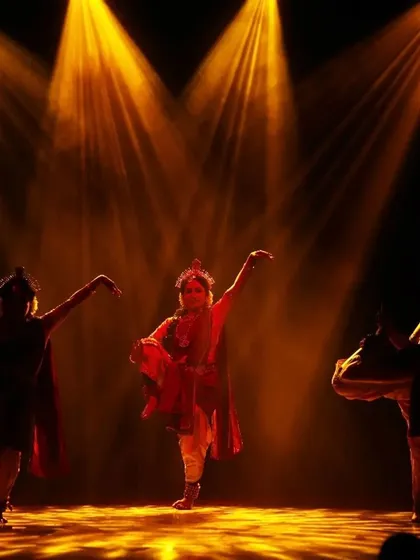A beautifully synchronized moment from "Shrishti Stithi Laya". The three dancers move as one, their forms highlighted by dramatic spotlights, embodying the principles of creation, preservation, and dissolution.