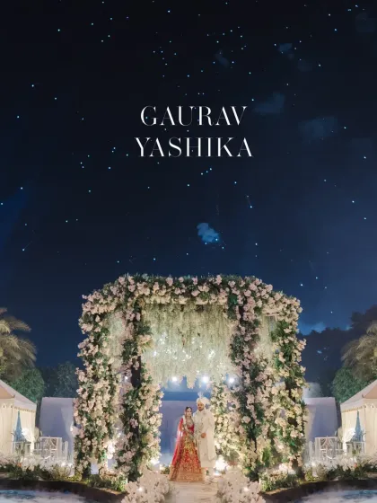 Under a canopy of stars, their wedding mandap felt like a celestial dream. This shot is about capturing the scale of the celebration and the magic of a night wedding, where the couple stands as the focal point of a universe created just for them.