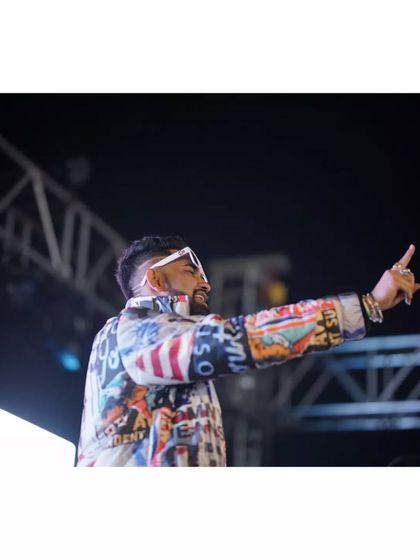 On stage, pointing to the crowd, feeling the energy. This is my element, where I can express myself through music and connect with thousands of people at once.