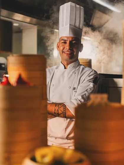 A powerful portrait of a chef at Yauatcha, framed by dim sum steamers. My goal with staff photography is to capture their professionalism and personality, presenting them as the proud experts behind the culinary experience.