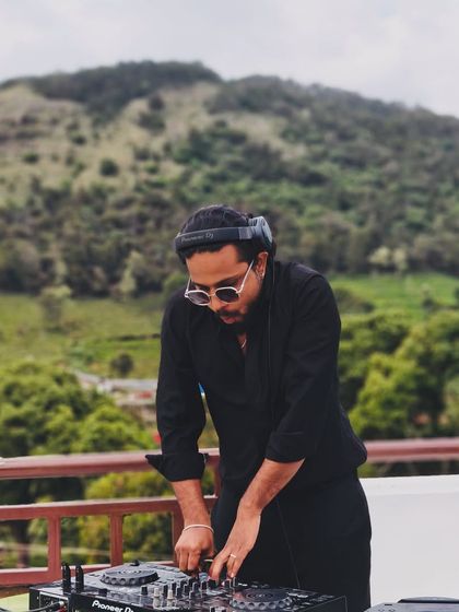 These shots capture me in my element, from different angles and at various events. Each one is a glimpse into my life as a music maker, focused on the craft and connecting with the crowd.