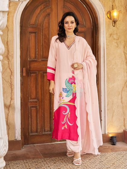 This extensive collection features a wide array of modern festive attire. From vibrant sharara sets and elegant anarkalis to chic jumpsuits and light lehengas, these pieces are curated for wedding guests and anyone looking for a stylish outfit for a special occasion.