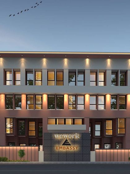 A frontal 3D render of the WeWork Embassy building facade.