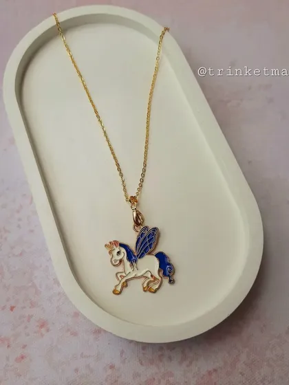 This majestic winged unicorn necklace in blue and white is perfect for kids who love mythical creatures. The gold-tone chain adds a touch of elegance.